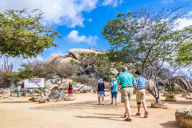 Aruba Island Sightseeing Tour Plus Arashi Beach Visit - Pickup, coach setup, and what to expect from the morning