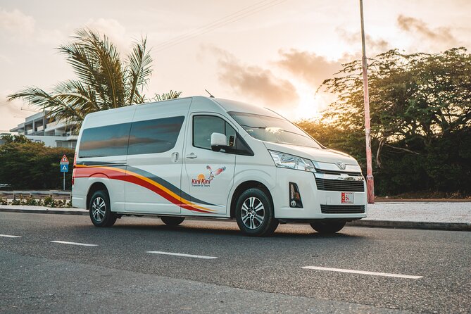 Aruba Private Van Airport Transfer (Max 5) - How the pickup actually starts: flight tracking plus a name sign
