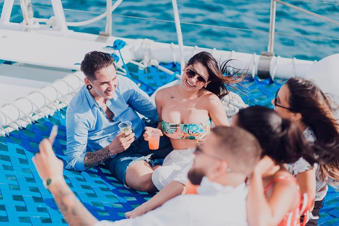 Aruba Sunset Cruise plus Seaside Dinner - Onboard Energy: Open Bar, Snacks, and the Music That Sets the Mood