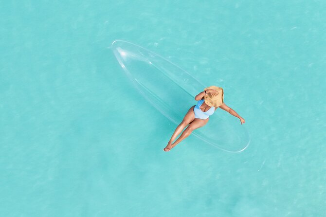 Aruba Unique Clear Kayak Drone Photoshoot with Video - Price Breakdown: $80.50 for Drone Style, Not Just a Routine Shoot