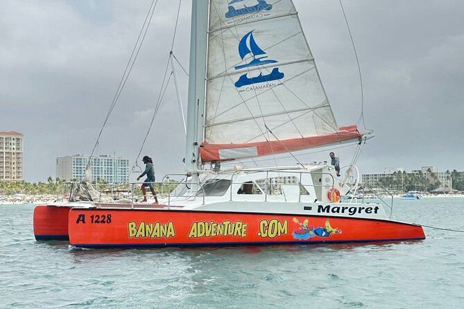 Banana Adventure Catamaran Tropical Sunset Sail - Shipwrecks, lighthouse views, and beachfront homes before the sun drops