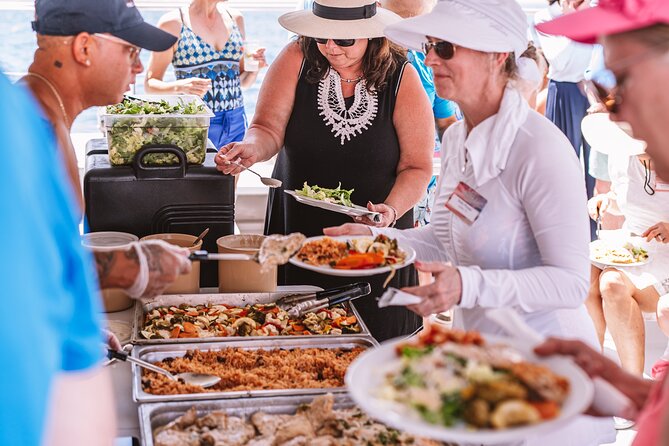 Half-Day Snorkel Sail Tour with Caribbean Lunch - Lunch buffet plus open bar: what you’ll eat and drink while sailing