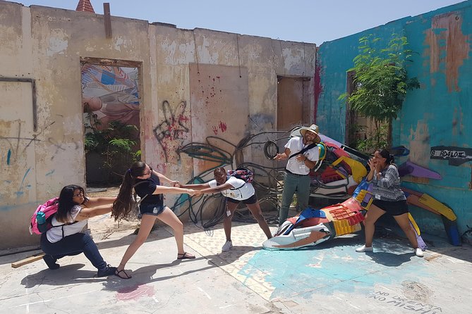 The Whole Story Tour + A Ride - Stop 1 at ArtisA Gallery: where you learn the language of the murals