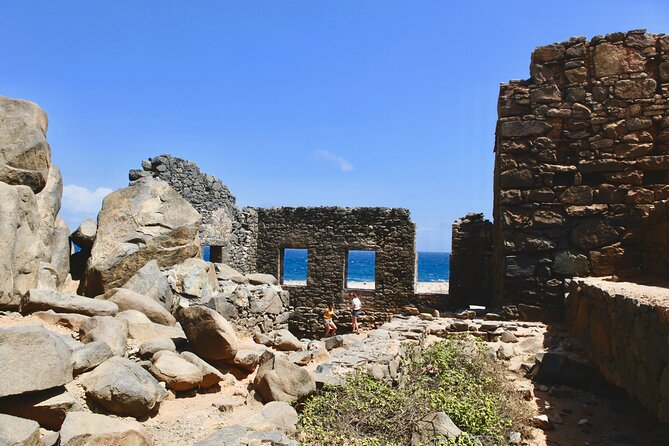 ThrillSeekers: Aruba UTV Tour & Cliff Jump at Natural Pool - Northern Coast Photo Stops: Wariruri Bridge and Bushiribana Gold Mill Ruins