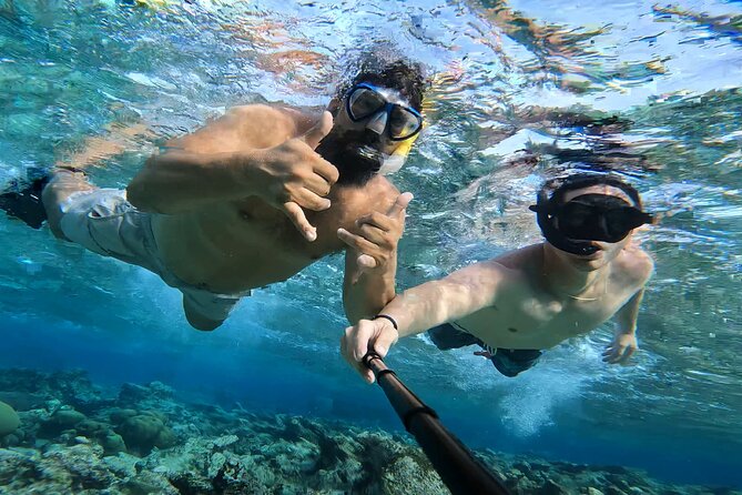 Tropical Sailing Experience with BBQ Lunch or BBQ Dinner in Aruba - Surfside Beach moments and the BBQ lunch or dinner that actually fills you up