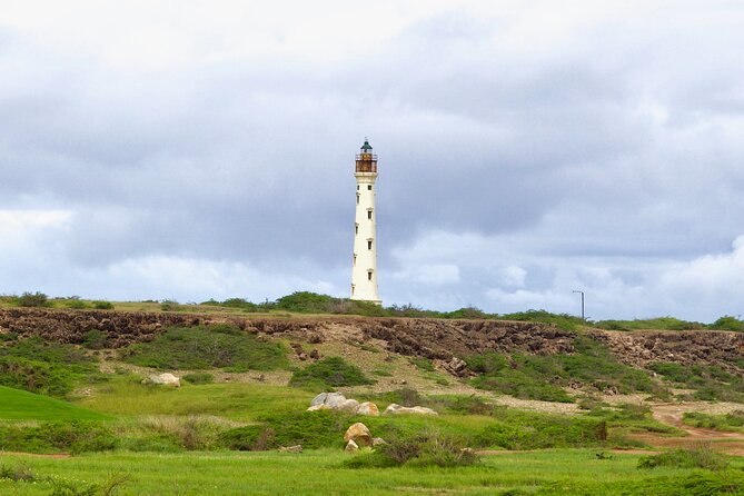 Ultimate Island Jeep Safari with Natural Pool, Baby Beach & Lunch - California Lighthouse and Gold-Era Ruins: Aruba’s North-Coast Stories