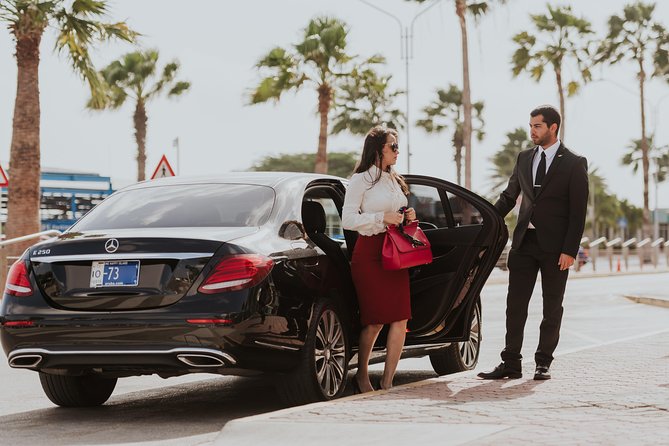 VIP Luxury Sedan Airport Transfer - The ride: private sedan comfort, direct routing, and bag help